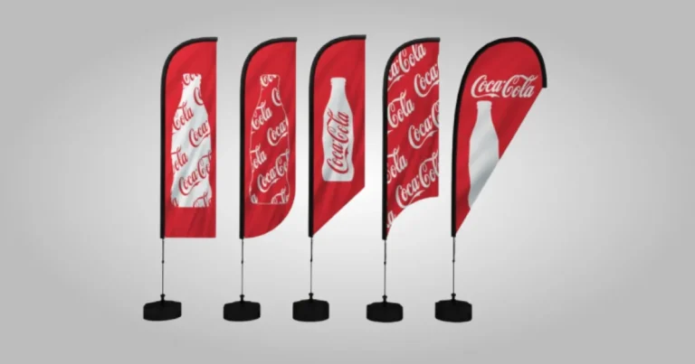 Five red angled flag banners on weighted bases