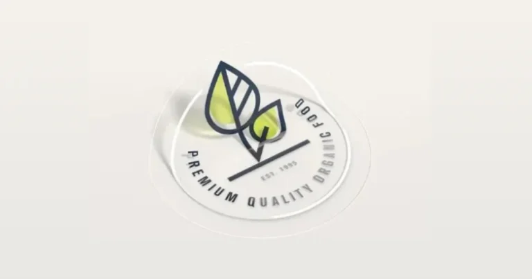 Round clear sticker with a leaf logo for organic food