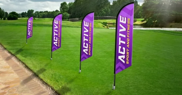 Purple feather flags lining a lawn for a sports and fitness brand