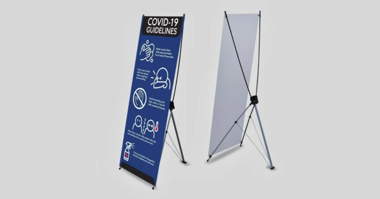X-stand banner with printed health guidelines beside the bare X-frame stand